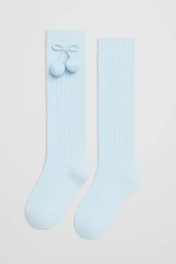 Calcetines largos pompones<Ysabel Mora